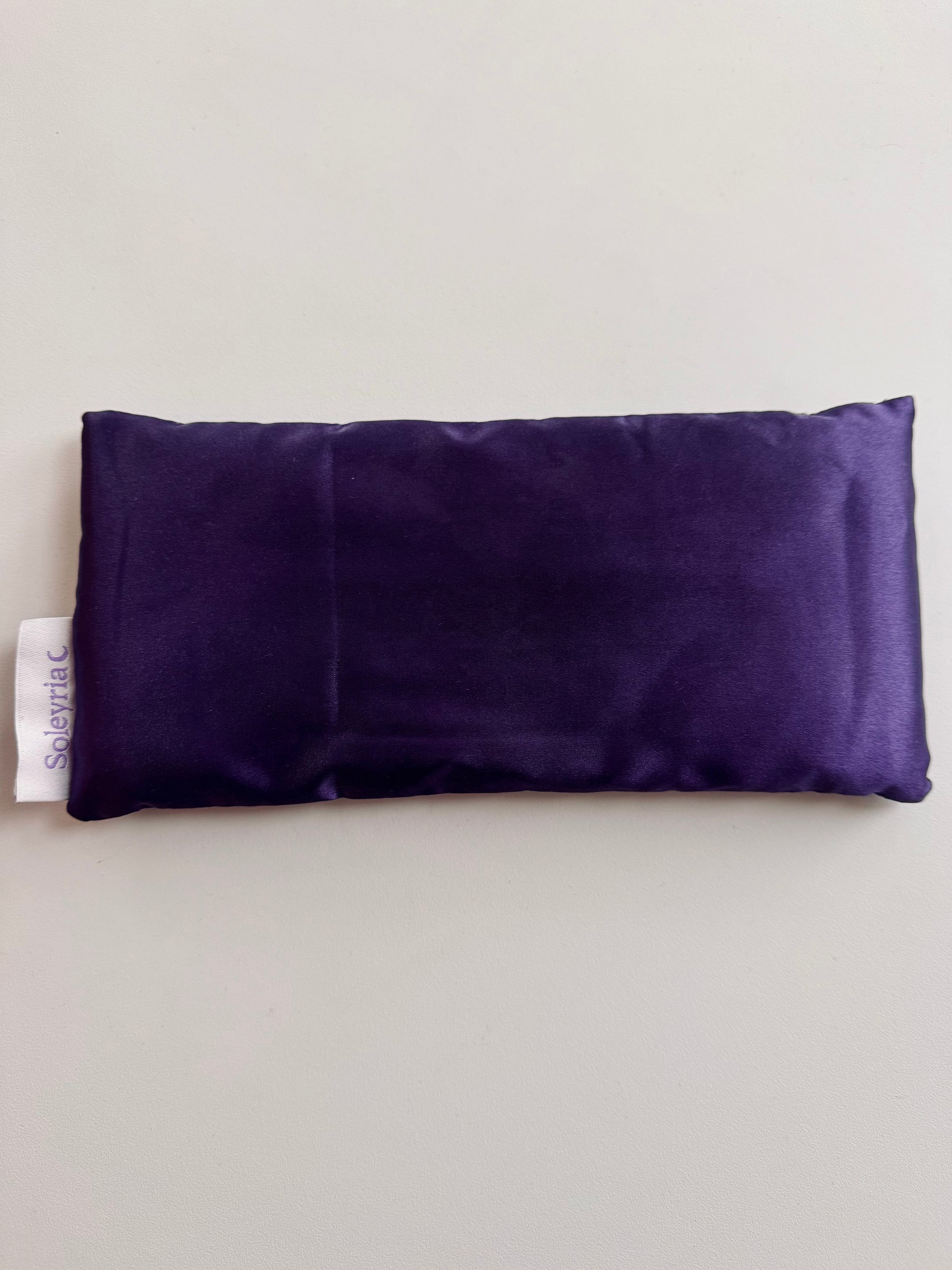 Soleyria purple satin lavender eye pillow for calming the nervous system.
